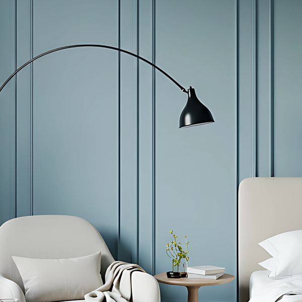 Scandinavian bedroom with white boucle furniture and warm, pale blue walls